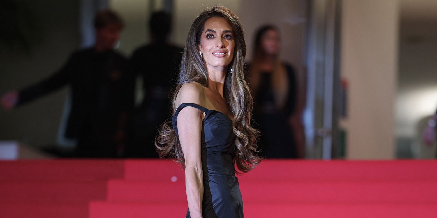 Amal Clooney Shines in Vintage Gold Gown at Cartier Awards, Balancing Glamour with Advocacy