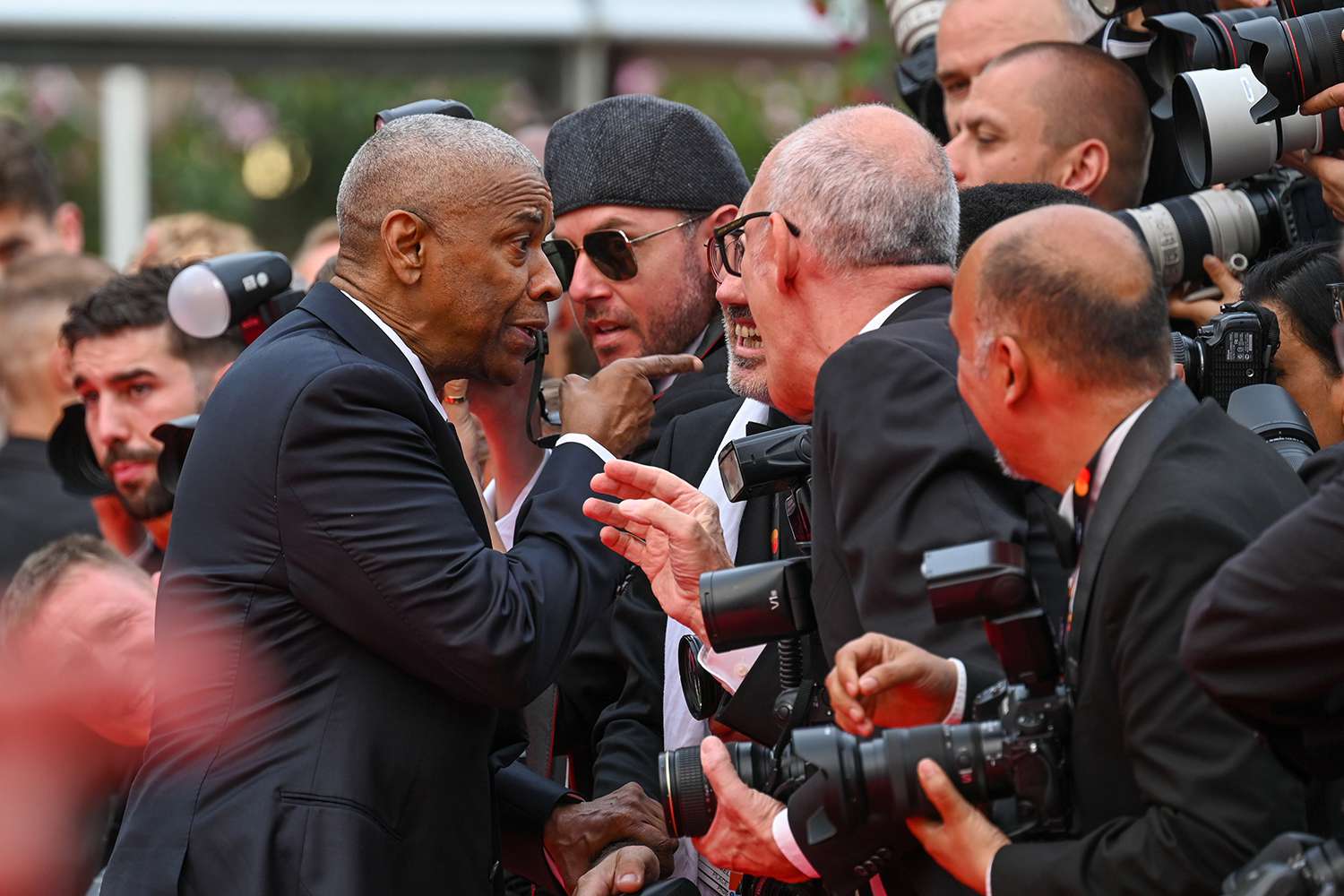 Denzel Washington Confronts Photographer in Red Carpet Clash, Then Receives Surprise Cannes Honor