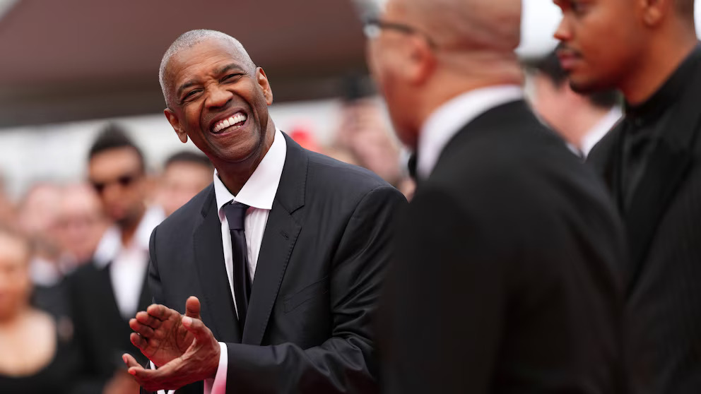 Denzel Washington’s Planned Cannes Absence Overshadowed by Red Carpet Clash and Palme d’Or Honor