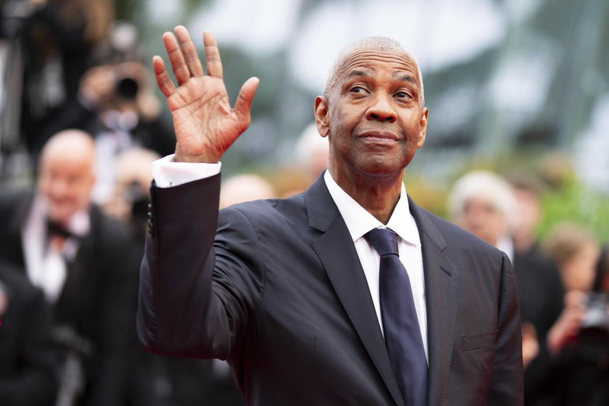 Denzel Washington’s Planned Cannes Absence Overshadowed by Red Carpet Clash and Palme d’Or Honor